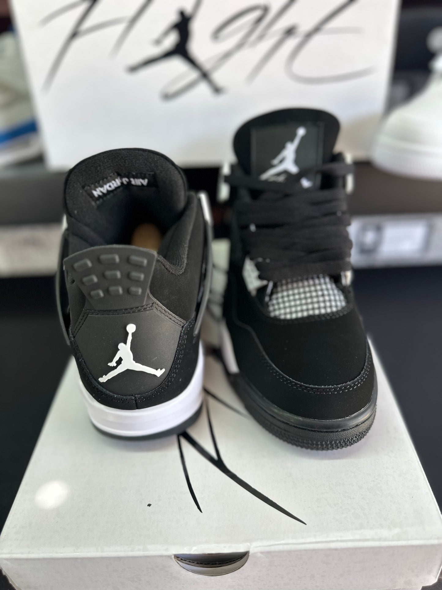Back view of black and white sneakers