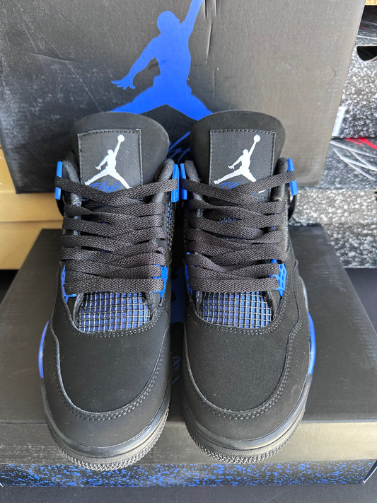 Black low top sneakers with royal blue accents
