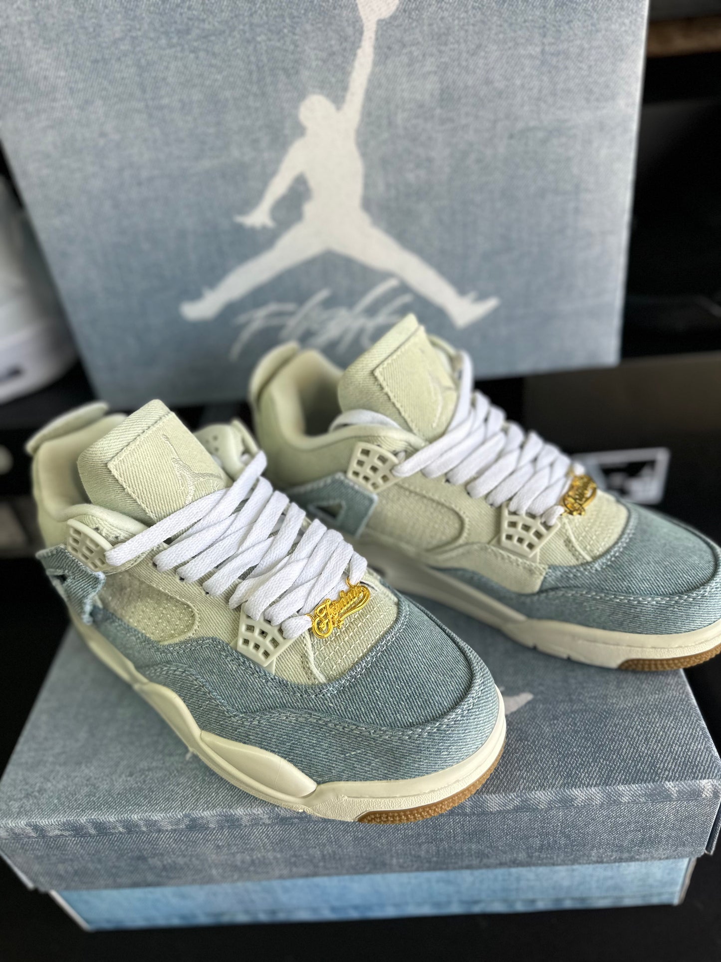 Front view of light blue and cream low top sneakers